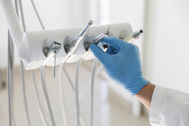 Professional Tooth Extraction technician working in Mead, WA